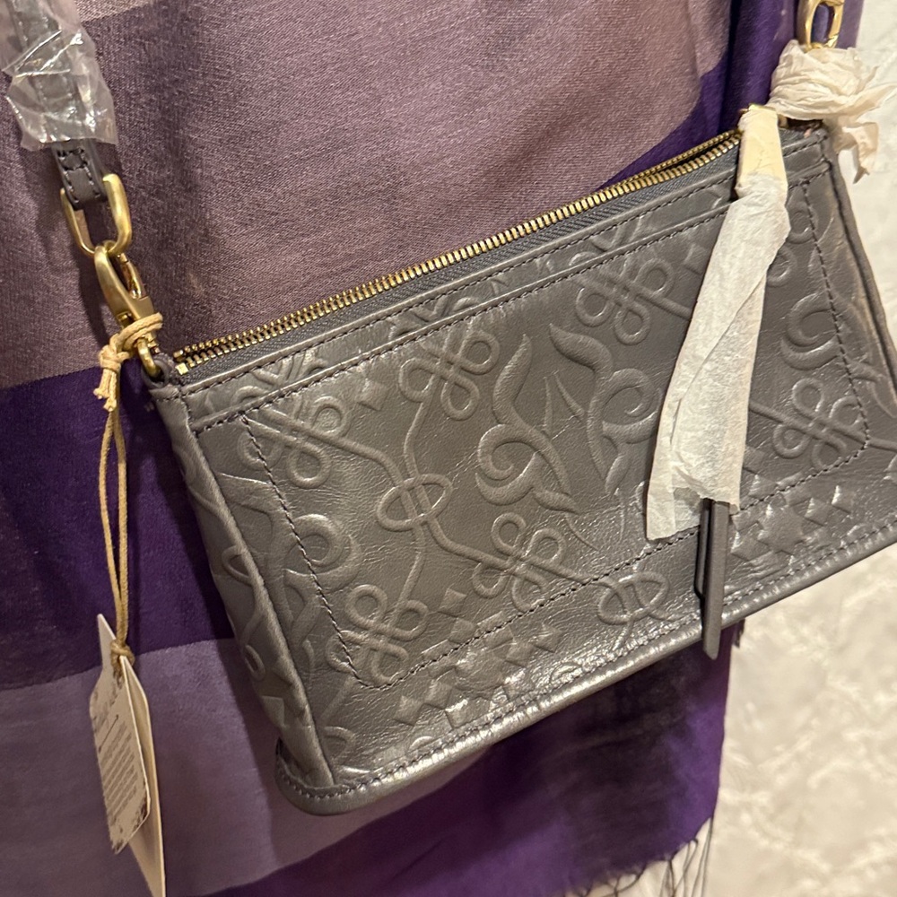 Hobo Cadence Damask embossed gray leather small convertible crossbody purse.